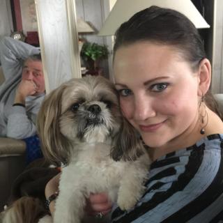 Miranda with her dog and her father