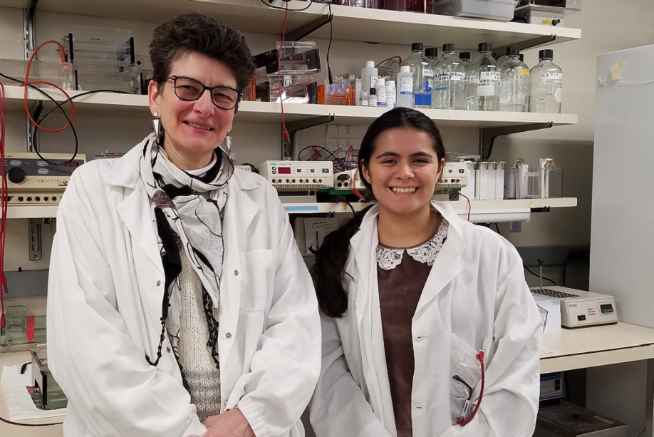 Dr. Esta Sterneck and a trainee in the lab