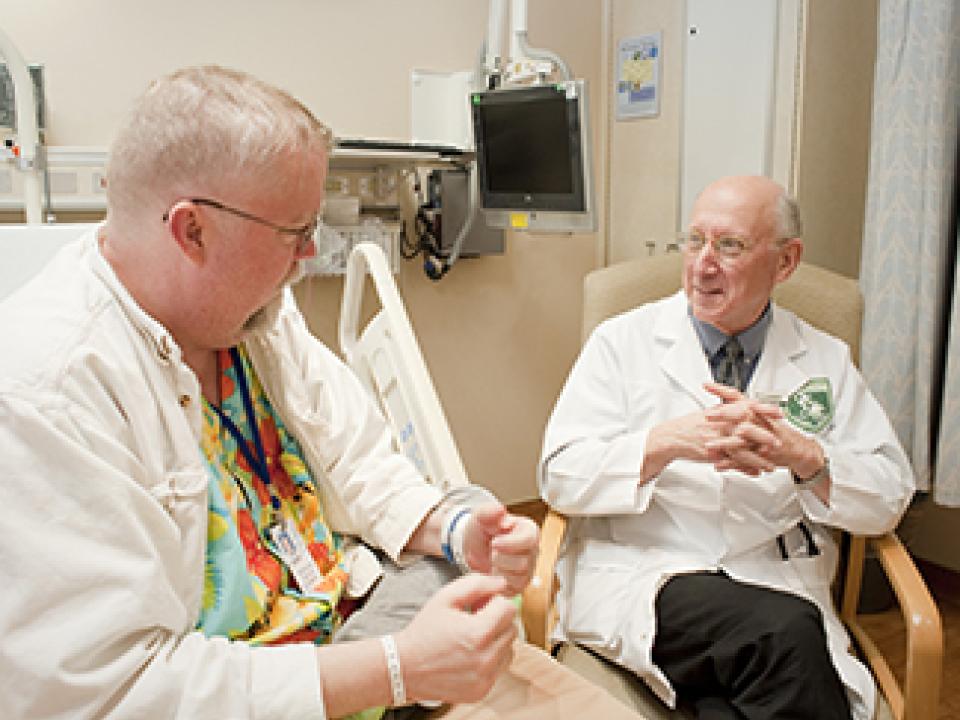 Dr. Rosenberg with a patient