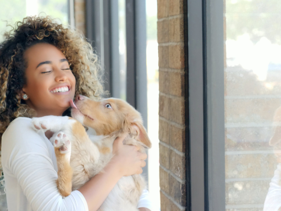 Woman holding a dog