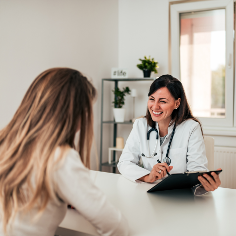 Female doctor and female patient