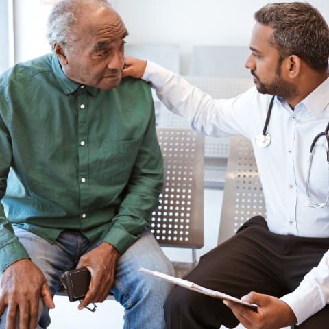 Doctor consults with patient