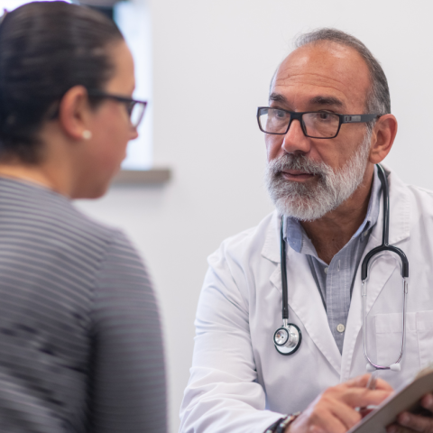 Doctor speaking with patient. Image credit: Canva
