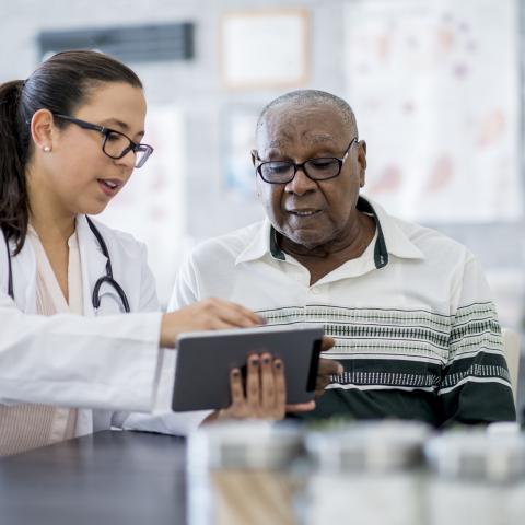 Doctor speaking with patient