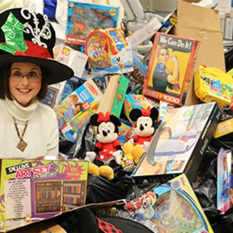 Julie Jones poses with toys