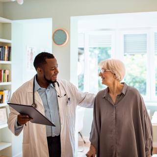 stock image of doctor with patient