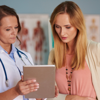 Doctor with patient. Image credit: Canva