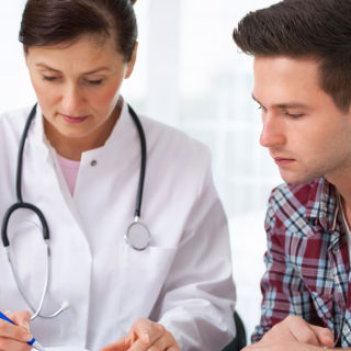 Doctor with patient. Image credit: Canva