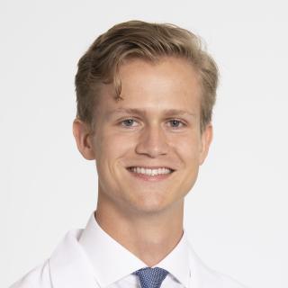 Headshot of August
