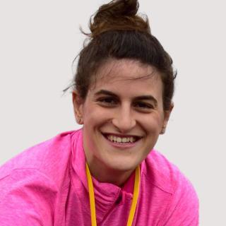 Maria smiles at the camera