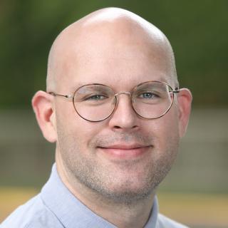 Headshot of Brett