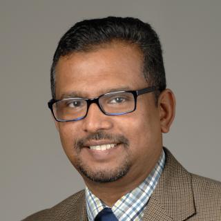 Headshot image of Dr. Suresh Kumar