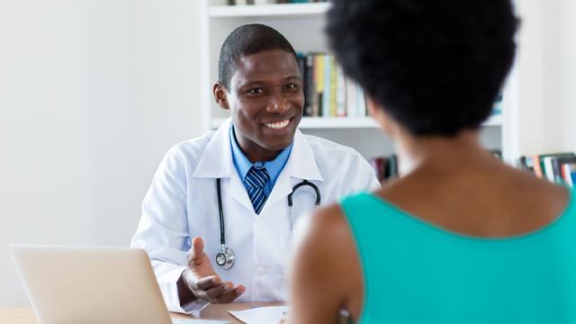 stock image of doctor with patient