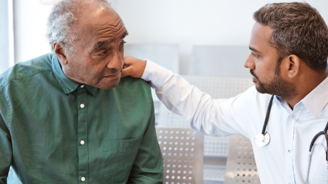 Doctor consults with patient