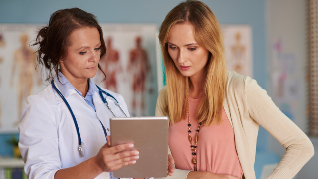 Doctor with patient. Image credit: Canva