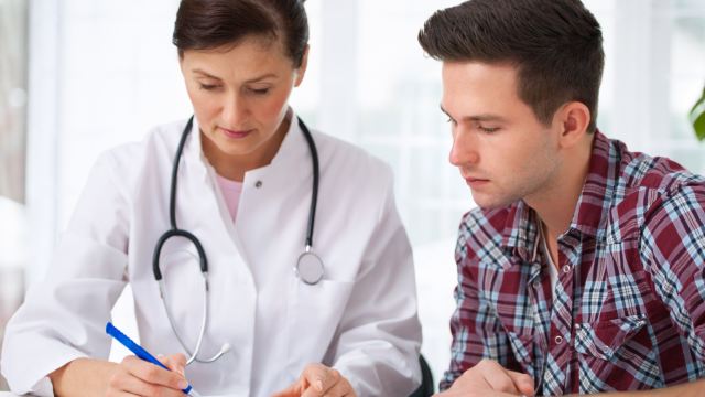 Doctor with patient. Image credit: Canva