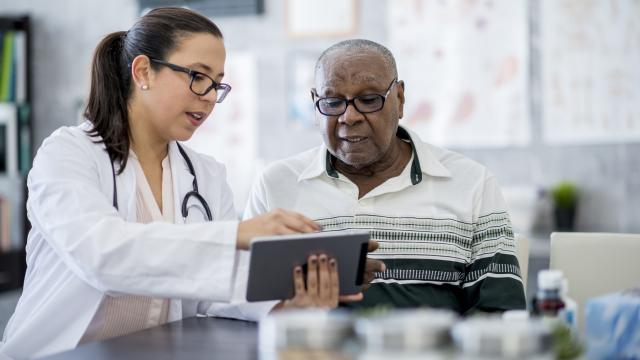 Doctor speaking with patient
