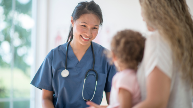 Mother and child with doctor