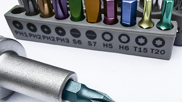 A screwdriver with a variety of screwdriver heads in different sizes and shapes.