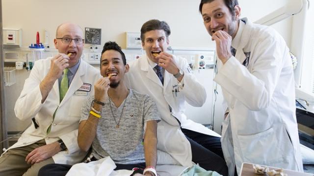 Jeremy Davis, Joel Rodriguez, Jonathan Hernandez and Adam Cerise celebrate Joel’s successful surgery with burgers and fries.
