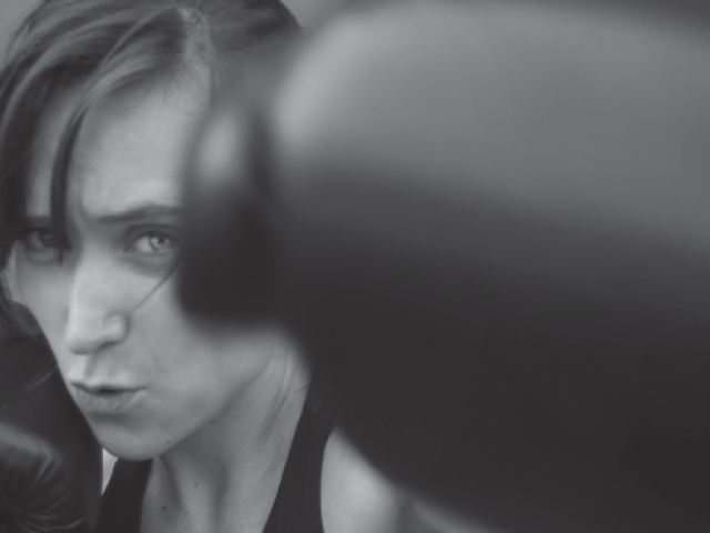 One-Two Punch for Cancer- Female boxer throwing a punch