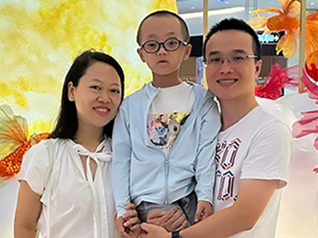 Duy Anh “Harry” Le, 9 years old, with his parents.