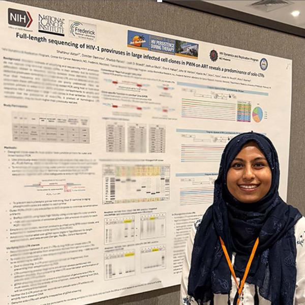 Photo of person standing in front of a poster with the title "Full-length sequencing of HIV-1 proviruses in large cell clones in PWH on ART result in predominance of solo-LTRs
