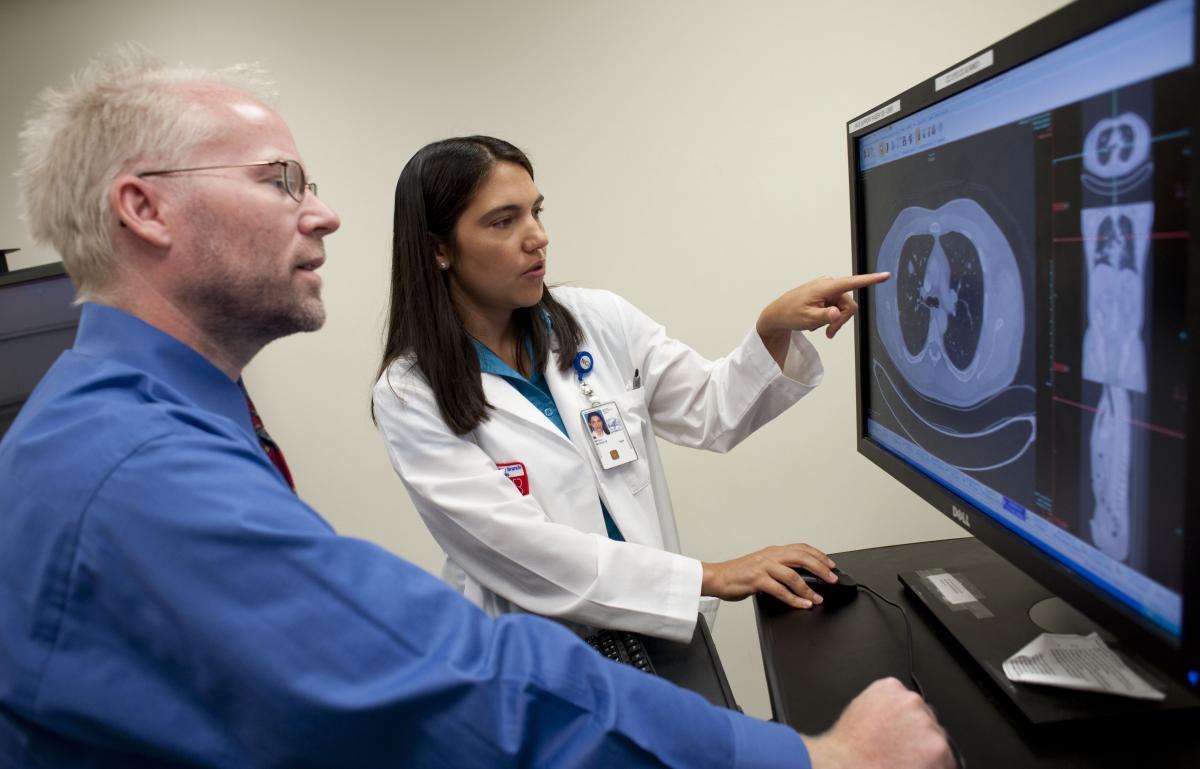 Doctor discussing an MRI with a patient