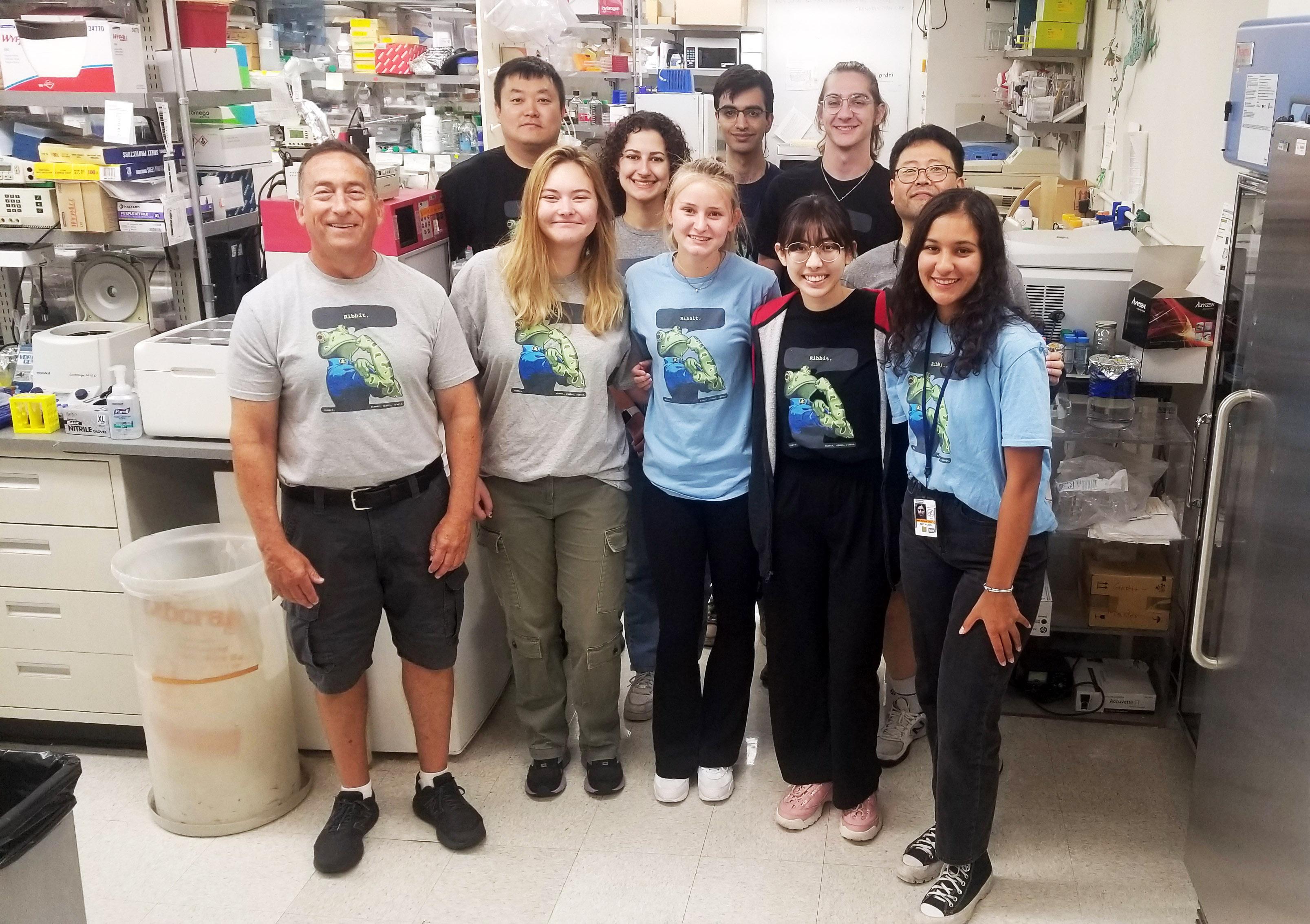 Daar Lab sporting their new froggy t-shirts - Summer 2023.  Front row (L-R): Ira Daar, Olivia Bindewald, Elizabeth Goodwin, Valeska Zitta, Yasmine Zouhairi.  Back row (L-R): Jaeho Yoon, Maya Lines, Bilal Niazi, Kenan Murray, Yoo-Seok (Rich) Hwang. 