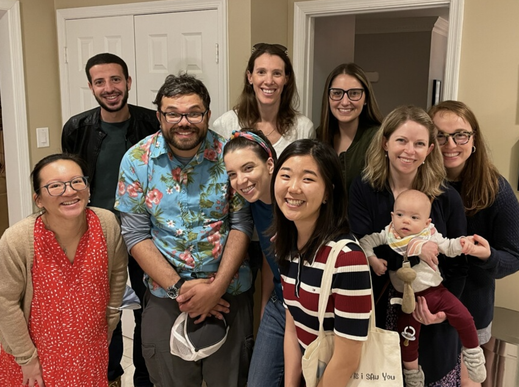 A group poses at a party