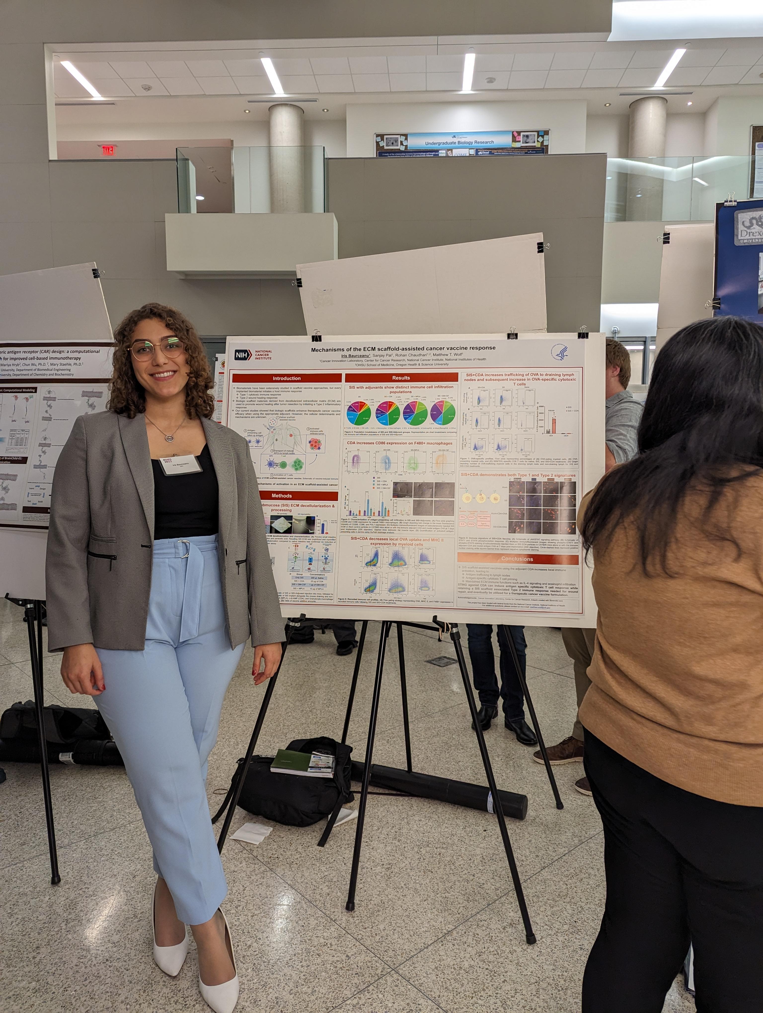 Iris Baurceanu presenting her work at the Immune Modulation & Engineering Symposium (IMES).