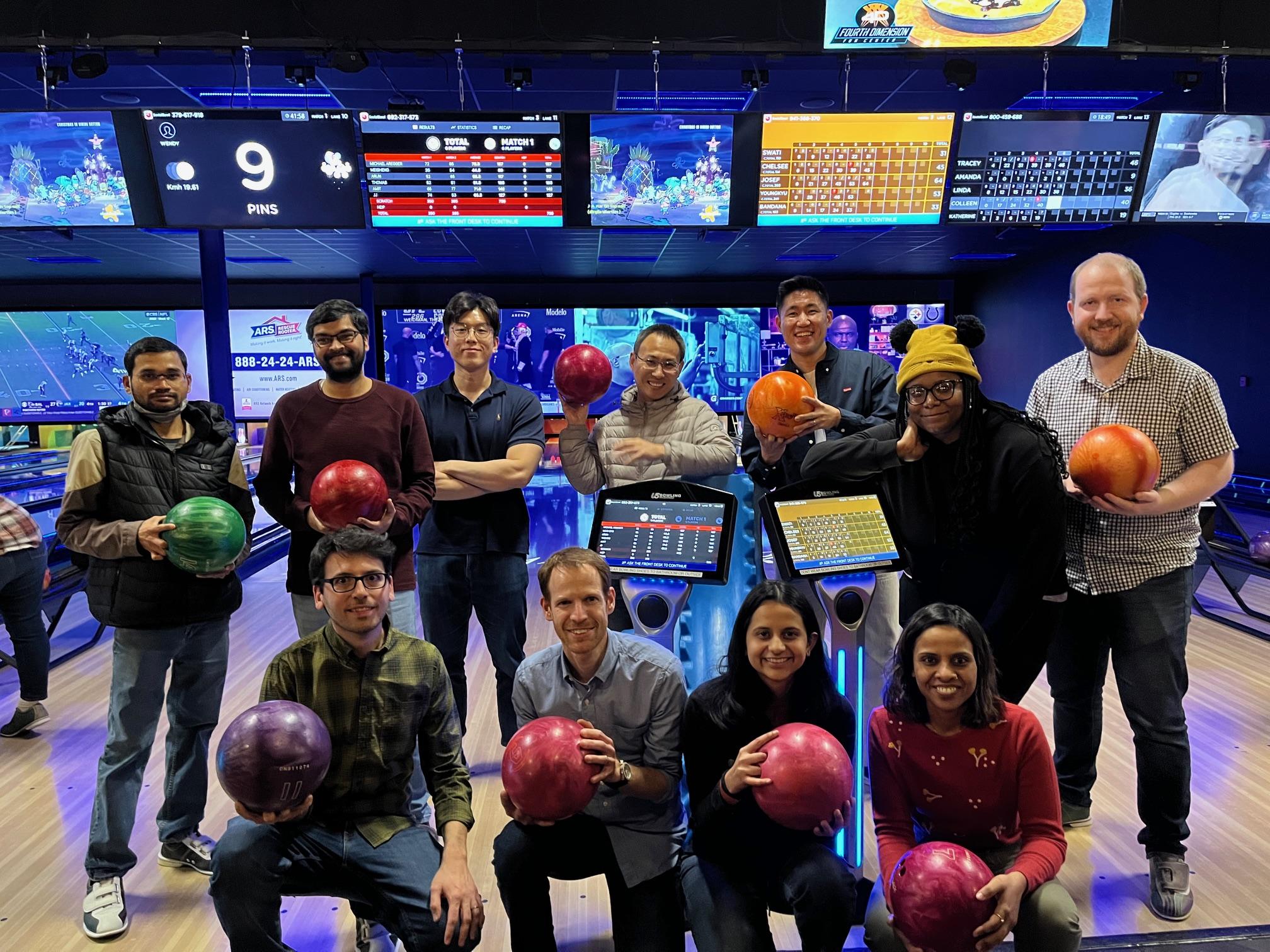 Group picture after playing bowling during our holiday gathering 2023