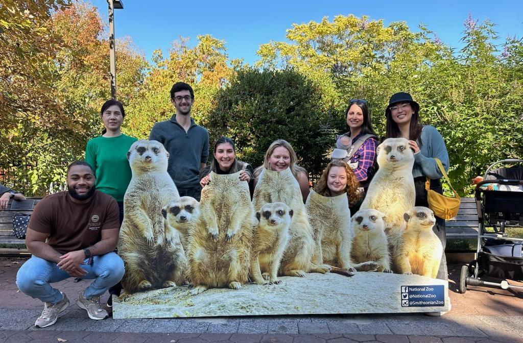 Lab members pose at the zoo.