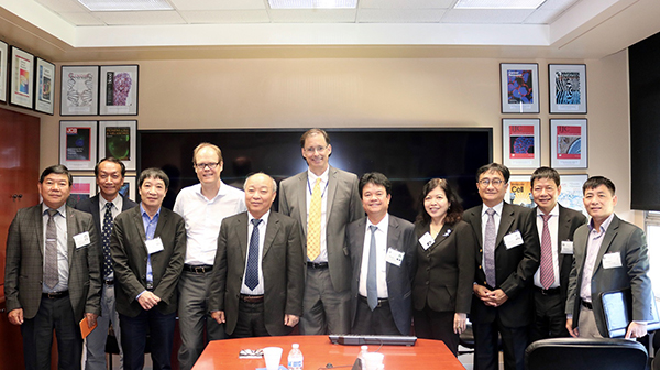 Visitors from Vietnam with Drs. Tim Greten and James Gulley